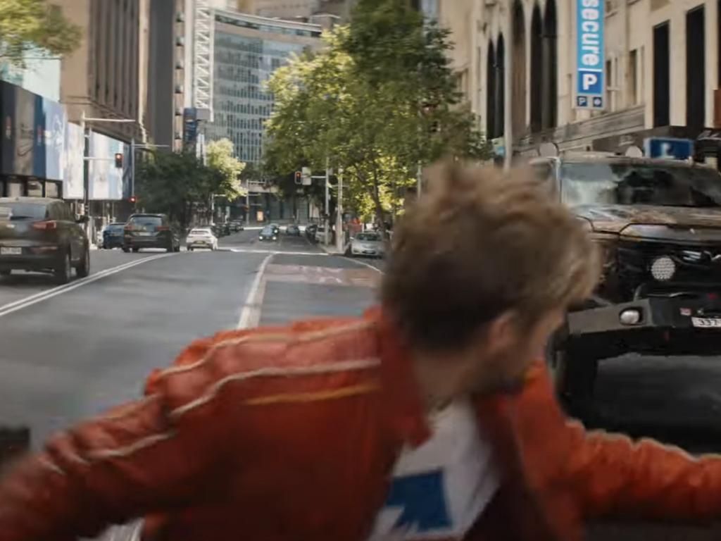 The Fall Guy filming locations in Sydney, Australia - Ryan Gosling Emily Blunt - Elizabeth Street with Chifley Square Chifley Plaza in background